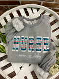 Nurse keepsake sweatshirt appliqued from a baby hospital swaddle blanket