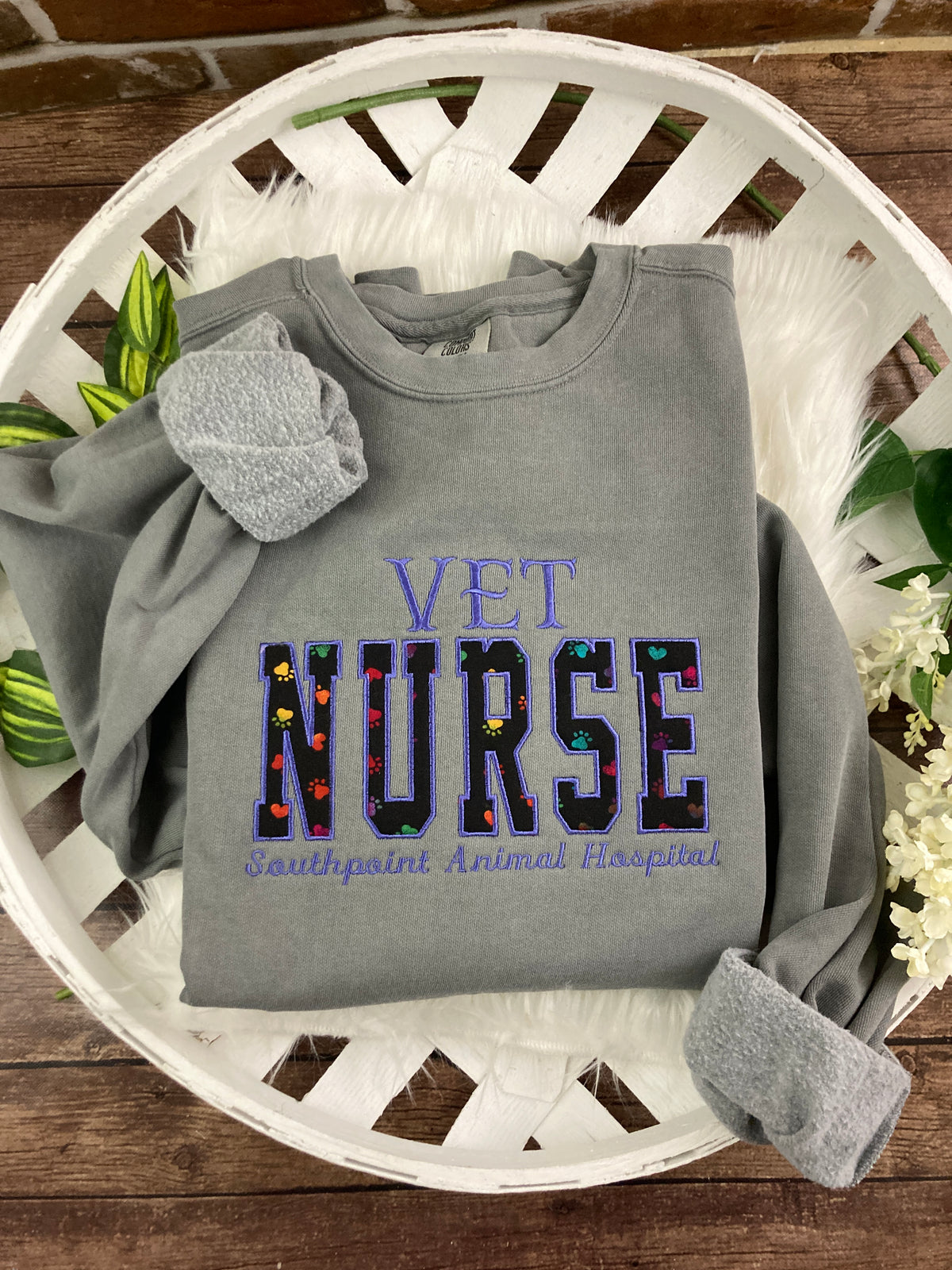 Vet nurse embroidered sweatshirt with rainbow paw print applique