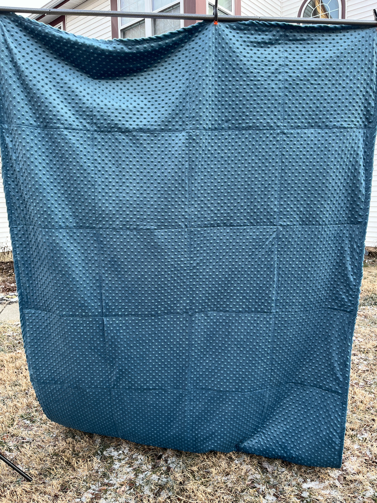 Memory quilt handmade from a loved ones clothing - layout view