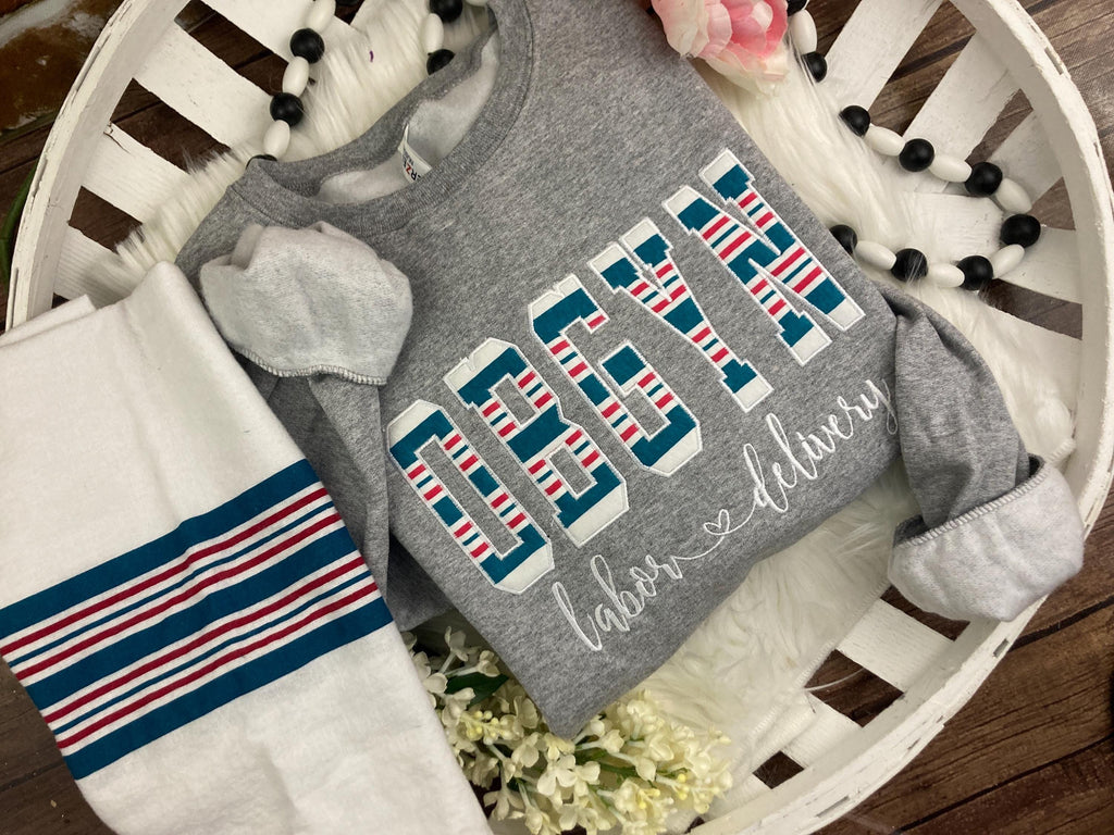 OBGYN keepsake sweatshirt appliqued from a baby hospital swaddle blanket - alternate view