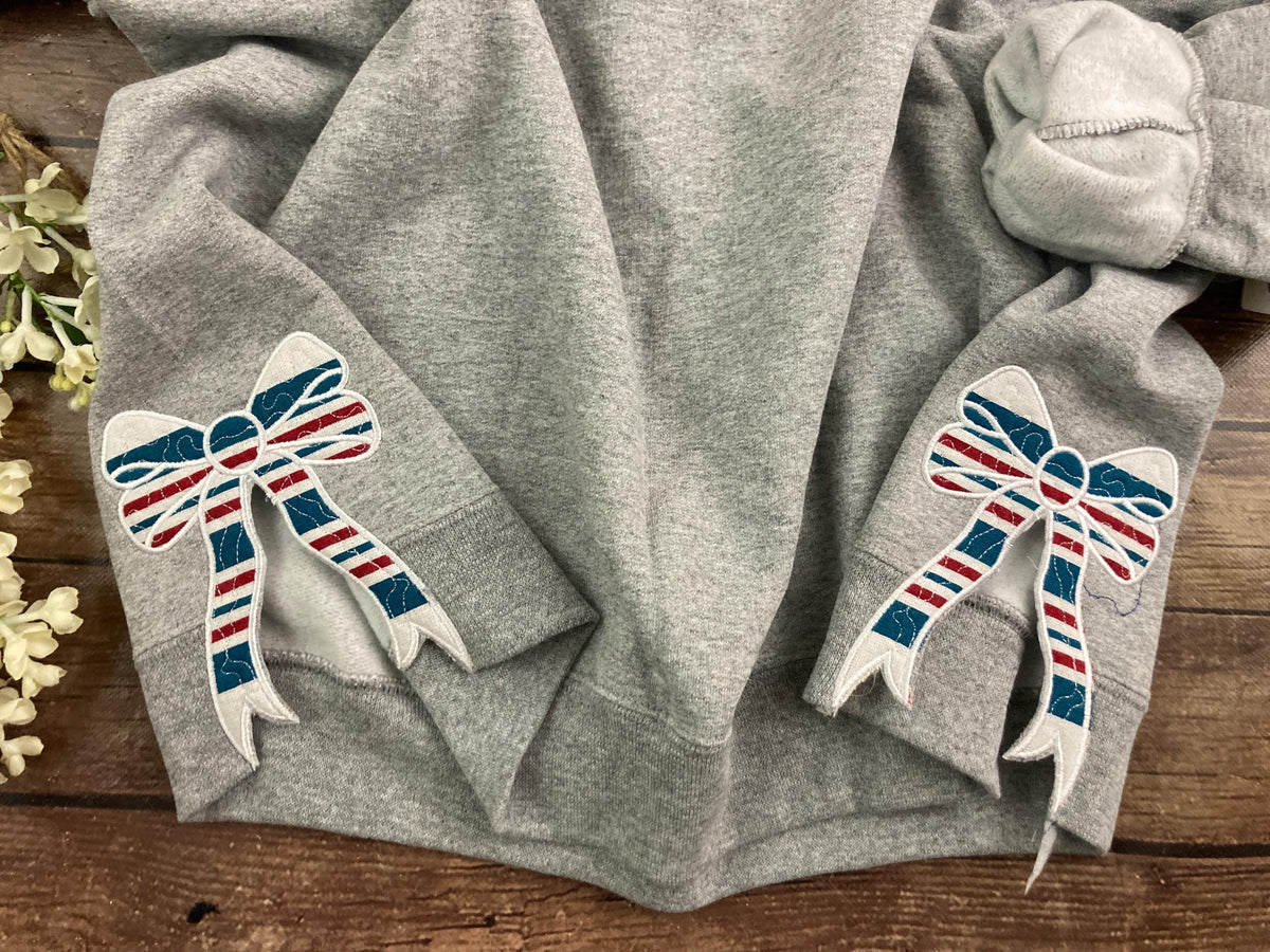 Nurse keepsake sweatshirt with side bows made from a baby hospital swaddle blanket - alternate view
