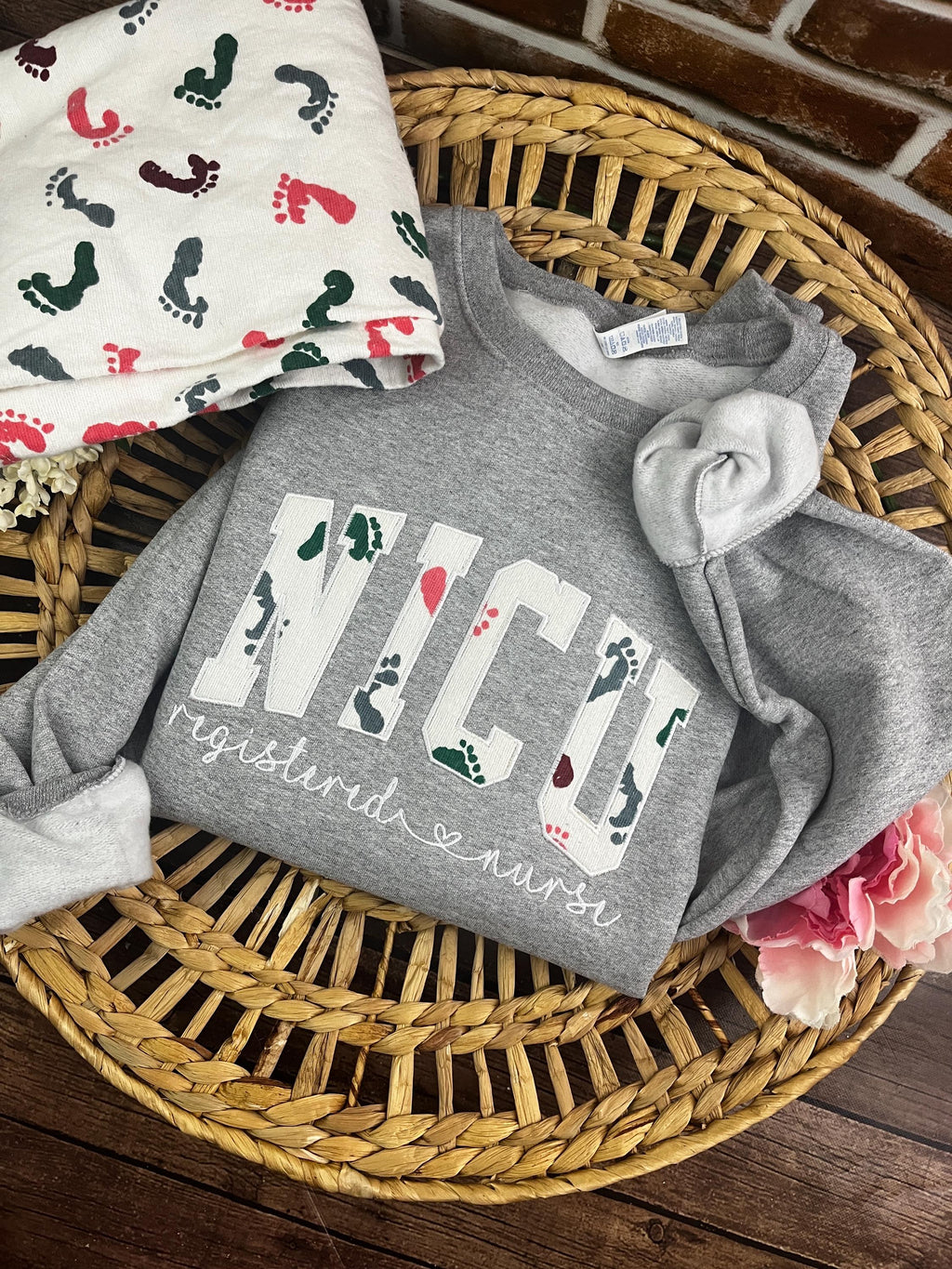 Curved NICU nurse embroidered sweatshirt made from a baby hospital blanket - alternate view