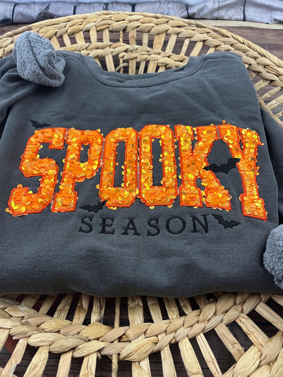 Halloween crewneck sweatshirt with orange sequin SPOOKY applique and embroidered bats - alternate view