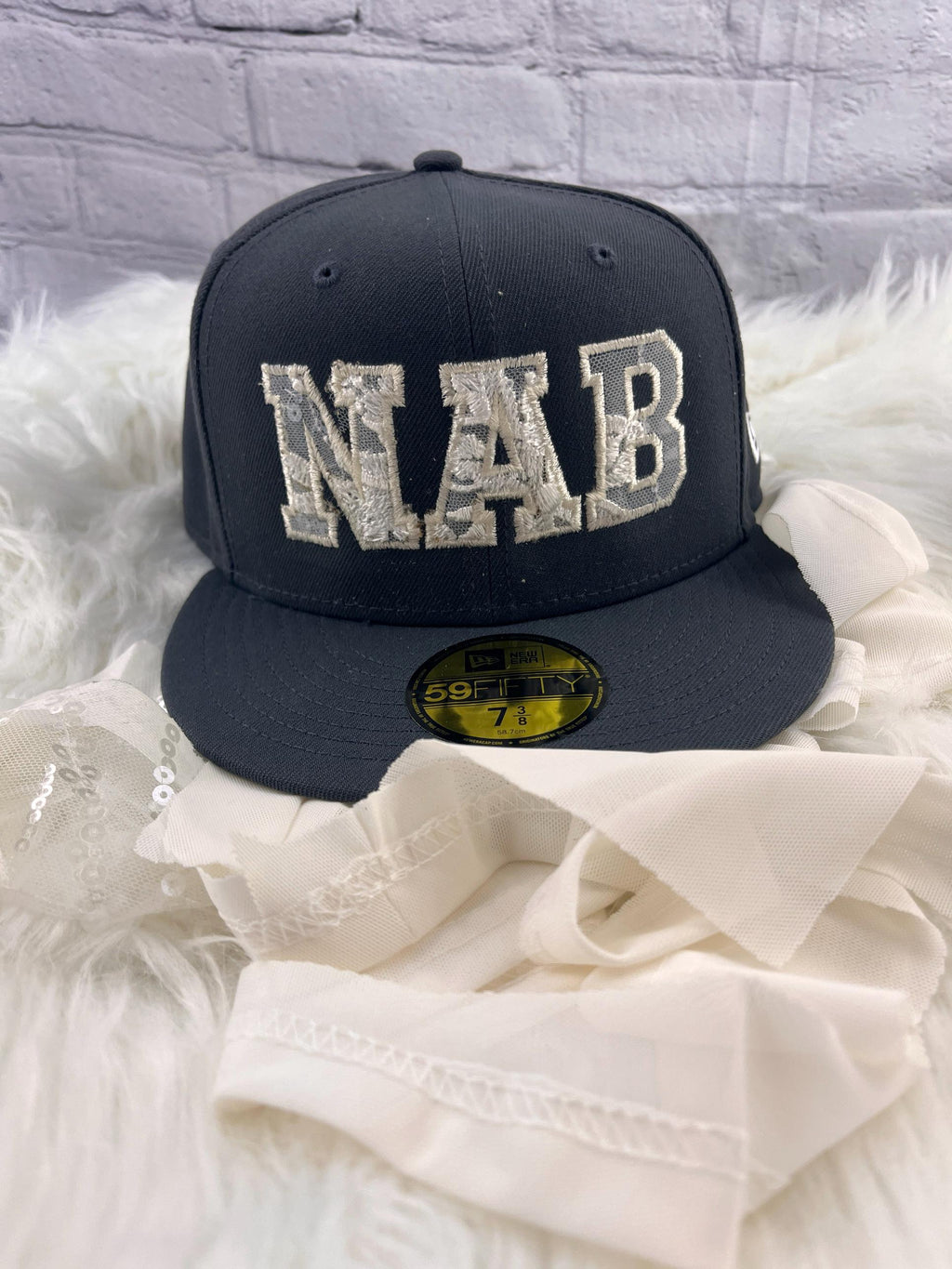 Navy keepsake cap with monogram appliqued from wedding dress lace and tulle