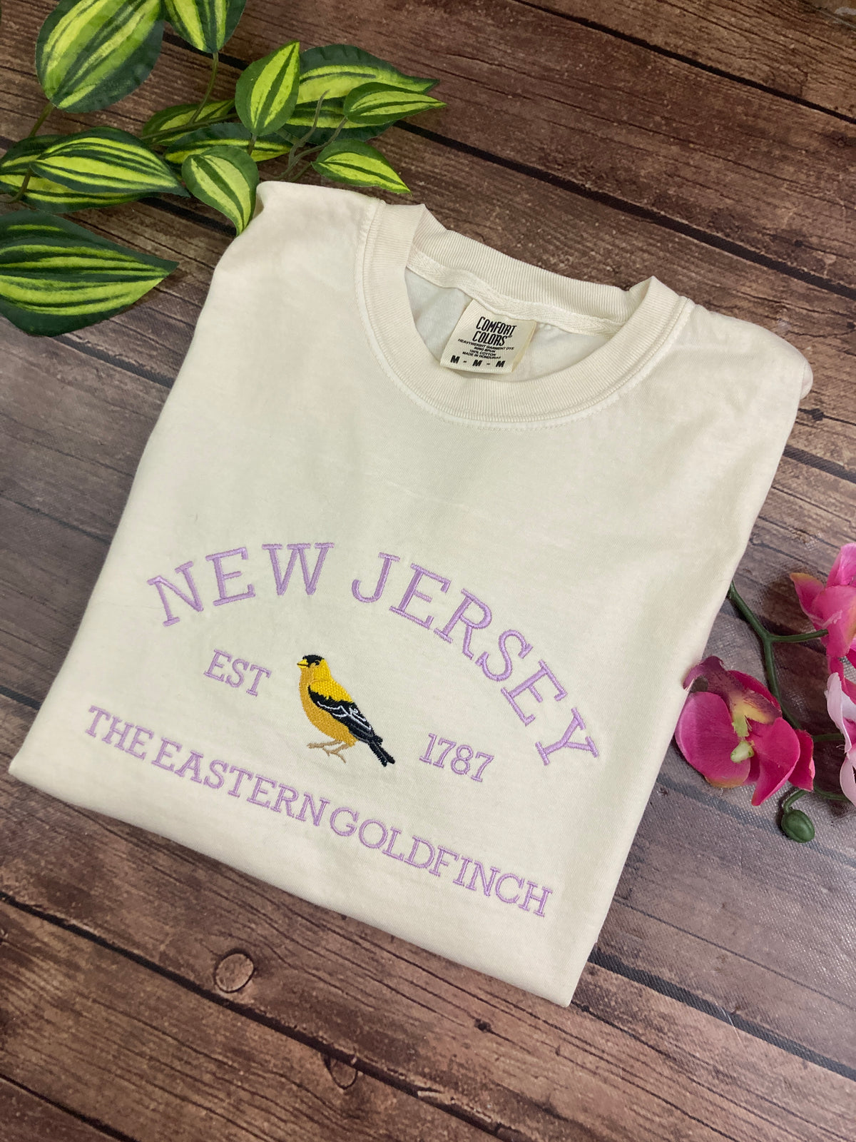 New Jersey goldfinch state bird embroidered sweatshirt - detail view